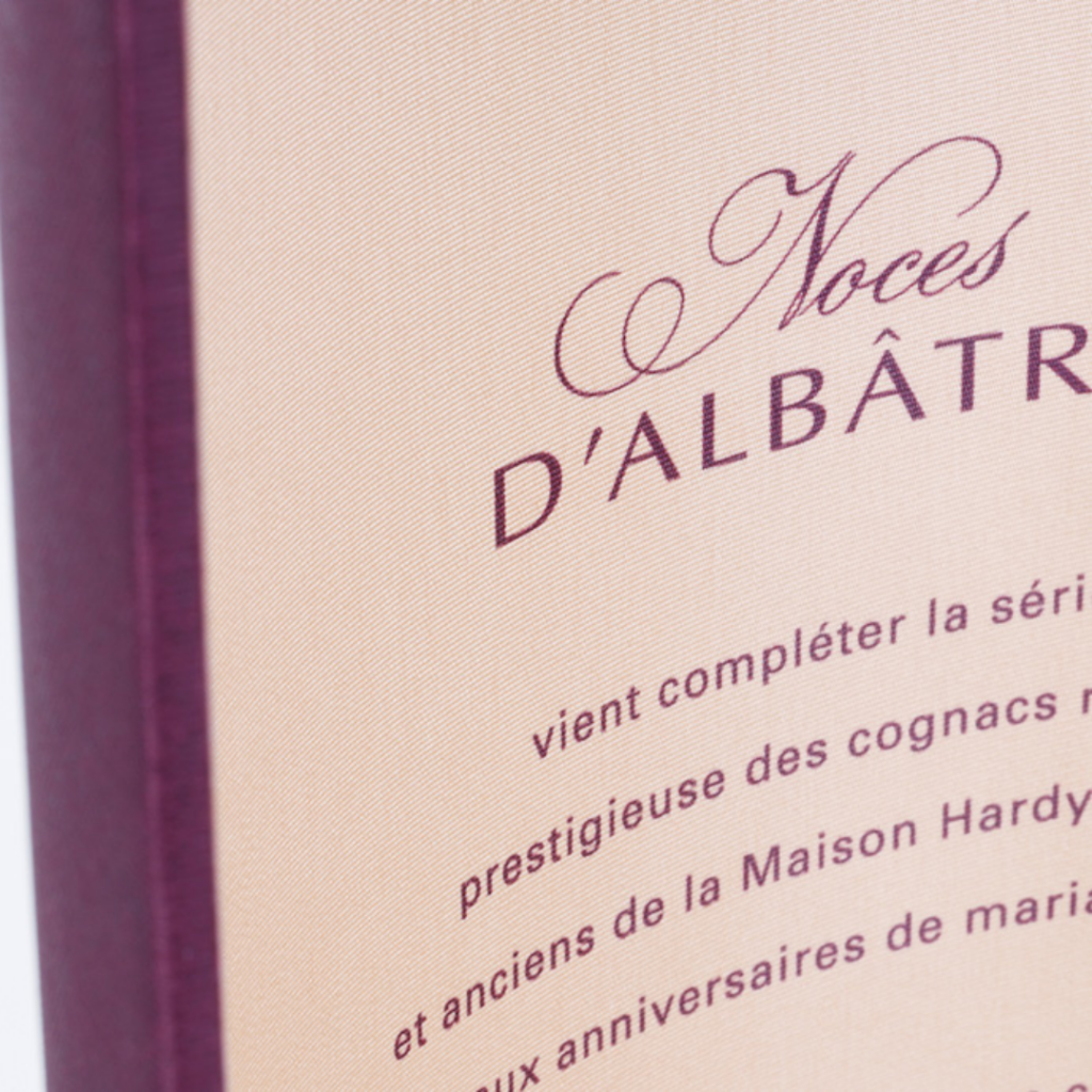 Luxurious cylindrical packaging with special print for Hardy Cognac